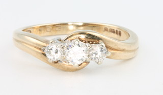 A 9ct yellow gold 3 stone diamond ring, approx. 0.33ct, size L 