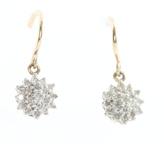 A pair of 9ct yellow gold diamond cluster earrings