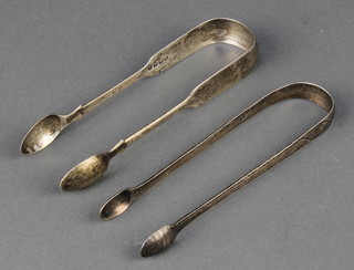 A pair of George IV silver sugar nips Edinburgh 1824 and a bright cut pair (rubbed date letters)