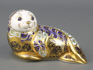 A Royal Crown Derby Imari pattern harbour seal paperweight with gold stopper no. 391/4500 5 1/2" 