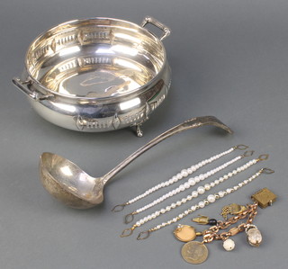 A silver plated ladle, a ditto casserole holder and minor costume jewellery 