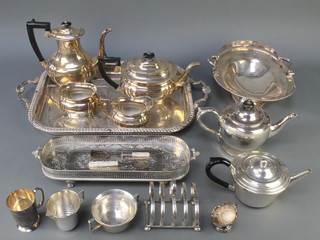 A silver plated 2 handled tray, a 3 piece tea set and other plated items