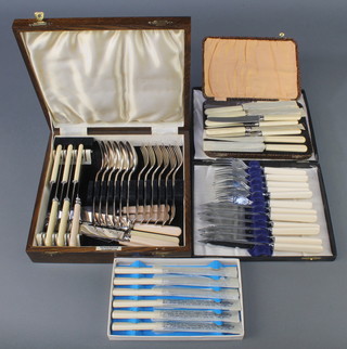 A silver plated cased set and 3 other plated cased sets 