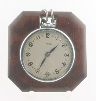 An Art Deco lady's Cord chromium plated fob watch in a walnut mount 
x
x