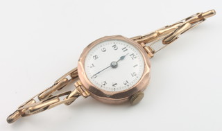 A lady's 9ct yellow gold wristwatch on a ditto bracelet 