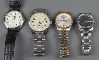 A gentleman's steel cased MG calendar wristwatch and 3 others