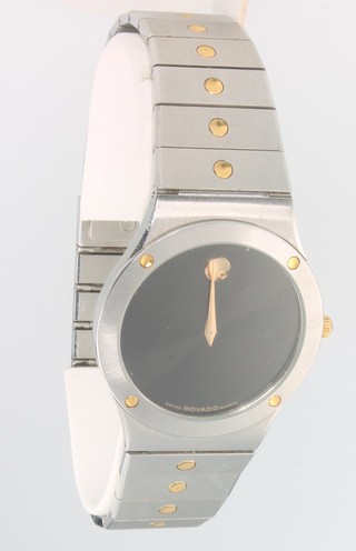 A gentleman's steel cased Movado wristwatch with black dial and articulated matching bracelet