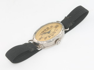 A lady's silver Art Deco oval wristwatch on a silver strap 
