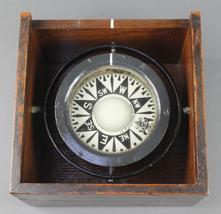 Whyte, Thomson & Company Glasgow, a gimballed ships compass contained in an oak travelling box  