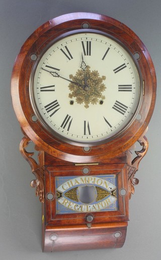 An American 8 day drop dial wall clock with 11 1/2" painted dial with Roman numerals, contained in a steel inlaid mahogany case, enclosed by a glass panelled door marked Champion Regulator, the back plate with label Superior 8 day clock 