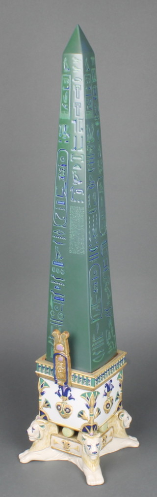 A turquoise ground Lladro Thotmes 1 Egyptian obelisk with lion mask feet 24 3/4"