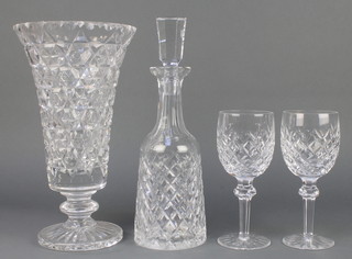 A Waterford crystal tapered decanter and stopper 13", a pair of ditto wines and a Stuart cut glass tapered vase 