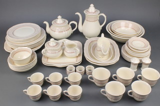 A Masons Ashlea part tea, coffee and dinner service, comprising 6 coffee cups, 6 saucers, 5 tea cups, 6 saucers, 6 small plates, 6 medium plates, 5 large plates, a meat dish, 6 dessert bowls, a sauce boat and stand, a salt and pepper, 3 napkin rings, sugar bowl, 4 serving bowls, 2 oval meat dishes, 2 sandwich dishes, teapot, coffee pot, sugar bowl and lid and cream jug 
