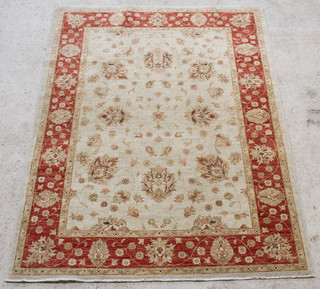 A Caucasian style rug with all-over floral design 79" x 59" 