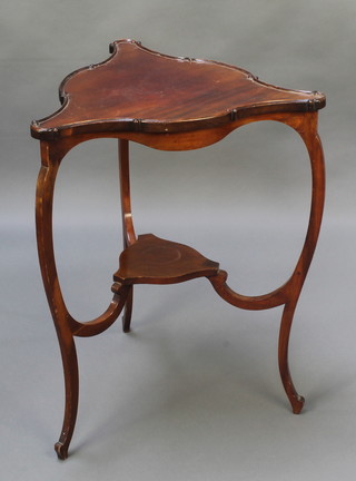 An Edwardian triangular mahogany 2 tier occasional table, raised on cabriole supports 28 1/2"h x 22"w x 20"d 