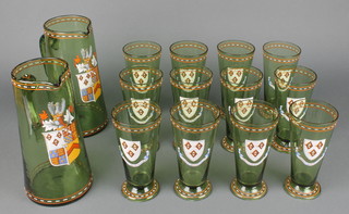 A set of 12 late 19th Century Continental green glass and enamelled beakers together with 2 jugs decorated with armorials 