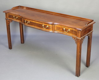 A Chippendale style mahogany side table with three-quarter gallery, fitted 1 long and 2 short drawers, raised on square tapered supports 29"h x 58"w x 15 1/2"d  
