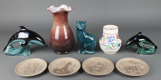 A Poole turquoise glazed figure of a seated cat 7", 2 ditto dolphins, 4 dishes decorated with wild animals, a squat vase decorated flowers and a free form vase 