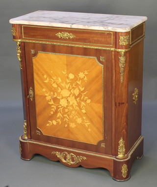 A French style walnut and simulated marquetry cabinet with white veined marble top enclosed by a panelled door, having gilt metal mounts throughout 40"h x 32"w x 16"d 