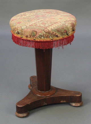 A William IV mahogany piano stool raised on a chamfered column and tripod base 19" x 13" 