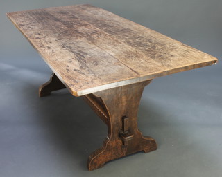 A bleached oak refectory table, the top formed of 4 planks raised on standard end supports with H framed stretcher 30"h  x 72"l x 32"w  