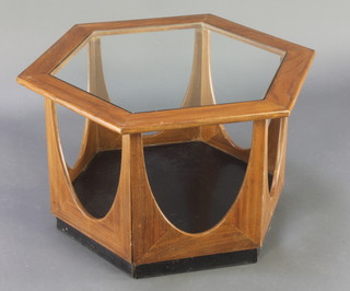 A G-Plan "Hexagon" teak coffee table designed by V B Wilkins in 1967, with plate glass top 17"h x 28 1/2"w x 25"d