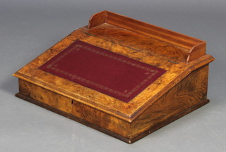 A Victorian figured walnut writing slope with three-quarter gallery inset a red leather writing surface and with stationery box 8"h x 21"w x 18"d (formerly the top of a Davenport) 