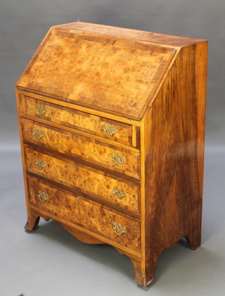 A Queen Anne style figured walnut and crossbanded bureau, the fall front revealing a fitted interior above 4 long graduated drawers, raised on splayed bracket feet 39 1/2" x 30"w x 17"d 
