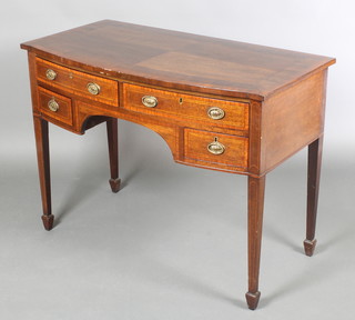 A 19th Century bow front mahogany side table with quarter veneered and crossbanded top, fitted 2 long drawers above 2 short drawers, raised on square tapered supports ending in spade feet 30 1/2" x 40"w x 21"d 