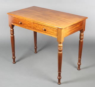 A Victorian mahogany side table fitted 2 drawers, raised on turned supports 29"h x 36"w x 20"d 