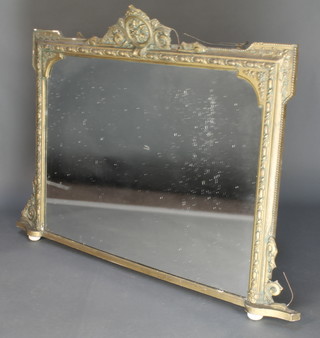 A 19th Century rectangular plate over mantel mirror contained in a painted gilt frame 36" x 43"