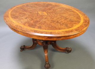 A Victorian oval figured walnut Loo table with crossbanded and inlaid top, raised on 4 turned columns with out swept supports 28"h x 41"w x 54"d 