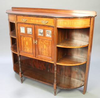 An Edwardian inlaid and simulated rosewood bow front chiffonier base fitted 1 long drawer above cupboards enclosed by inlaid and bevelled mirrored doors flanked by niches to the sides with undertier 41"h x 48"w x 13"d 