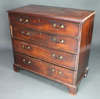 A Georgian mahogany chest of 4 long drawers with brass swan neck drop handles and escutcheons, raised on bracket feet 39"h x 43"w x 22"d 