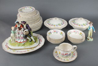A Royal Doulton Dovedale part dinner service comprising 10 small plates, 12 medium plates, 11 large plates, 2 tureens and covers, 6 soup bowls, 6 dessert bowls, sauce boat and stand and a meat plate together with a Meissen group 9" and a continental figure of a boy 4"