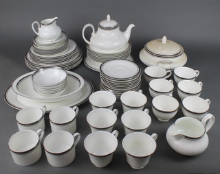 A Royal Doulton Sarabande and Pavanne matched tea, coffee and dinner service comprising 6 tea cups, 13 saucers, 6 cups, 4 coffee cans, 4 saucers, 6 small plates, 6 medium plates, 5 large plates, teapot, milk jug and cream jug, tureen and cover, serving plate, serving bowl, meat plate, 6 dessert bowls