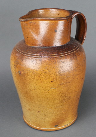A 19th Century stoneware jug with simple handle 14" and a tapered measure 3" 