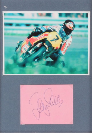 Barry Sheen, a colour photograph 11" x 8" mounted together with a signed pink autograph book page 