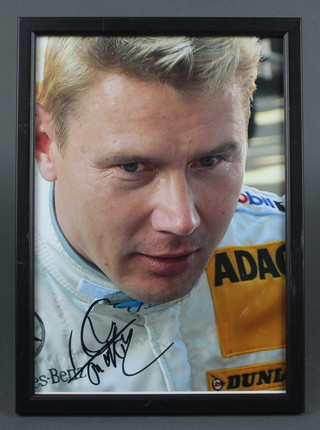 Mika Hakkinen, a signed colour photograph 