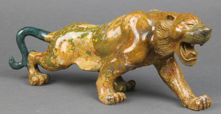 A carved and polished hardstone figure of a walking tiger 11" 