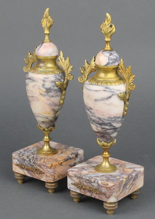 A pair of 19th Century Continental pink veined marble urns with gilt metal mounts 11" 