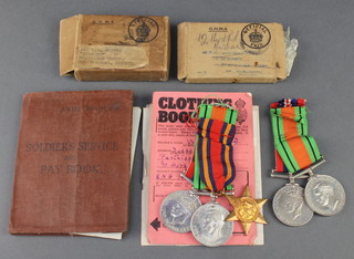 A group of 3 medals comprising Burma Star, Defence and War medal together with a pair Defence and War medal and soldiers pay book, various paperwork relating to Lieutenant Douglas Nelson Winter late of Partridge Green