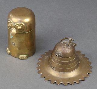 A brass Trench Art inkwell formed from the nose cone of a shell with hinged lid 2" and a cylindrical jar in the form of an owl 4" 
