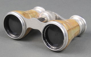 A pair of gilt metal and mother of pearl opera glasses complete with leather carrying case 