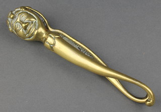 A pair of 19th Century brass nut crackers decorated a jester 7" 