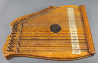A wooden harp zither 21" x 16" 