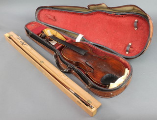 A violin, bearing label "Lorenzo Ventapane fabricante di strumenti armonici abita strada donnaregina No 2 Napoli 18" complete with bow and contained in a wooden case 13 1/2"
