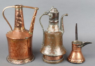 An Eastern bell shaped copper jug 14"h x 8" diam., a similar jug with spout 14" x 6" and a Turkish style waisted copper jug with side handle 5" x 5" 