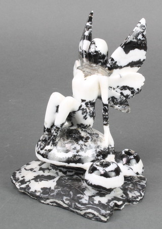 A carved hardstone pen stand in the form of a fairy on toadstool 7" x 5" x 4" 
