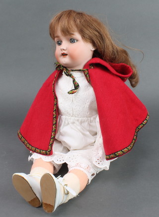 Simon and Halbig a 19th Century porcelain doll with opening and shutting eyes, open mouth with teeth, head incised W.S.K4 